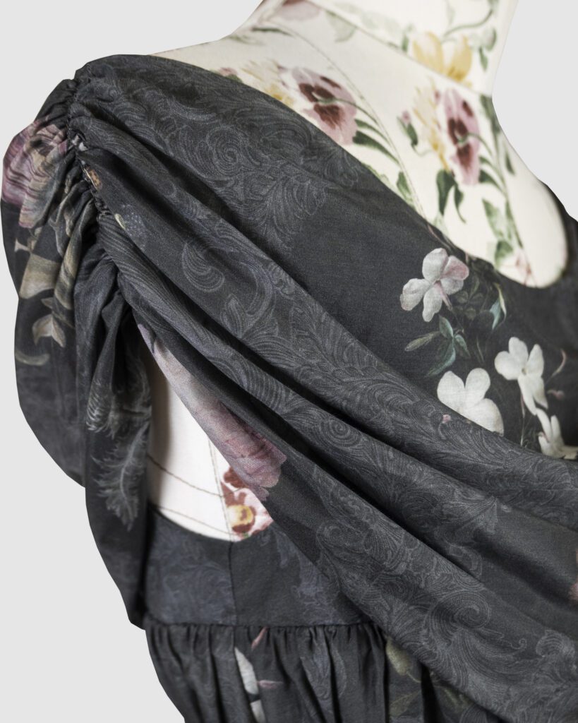 New printed dresses collection pre-order 29.11.2024 - 13.12.2024 and Black Friday sale! 23 Dark floral printed evening gown with cowl drapery on the neckline and irregular hemline