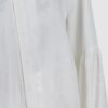 Shirt with asymmetrical fastening