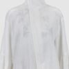 Shirt with asymmetrical fastening