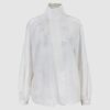 Shirt with asymmetrical fastening
