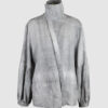 Relaxed fit shirt with stand collar, press stud asymmetrical fastening and double gathered bishop sleeves.