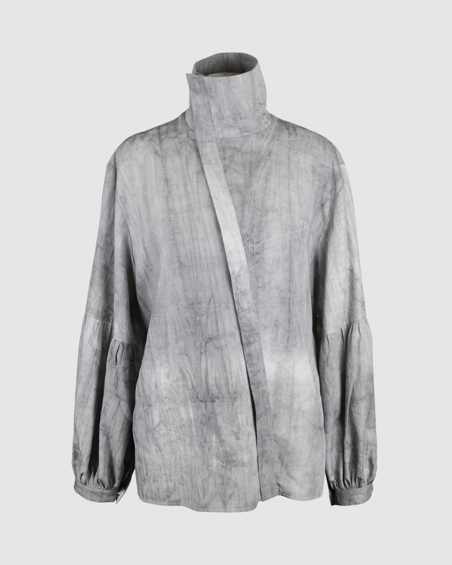 Relaxed fit shirt with stand collar, press stud asymmetrical fastening and double gathered bishop sleeves. Relaxed fit shirt with stand collar, press stud asymmetrical fastening and double gathered bishop sleeves.