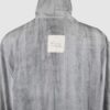 Relaxed fit shirt with stand collar, press stud asymmetrical fastening and double gathered bishop sleeves.