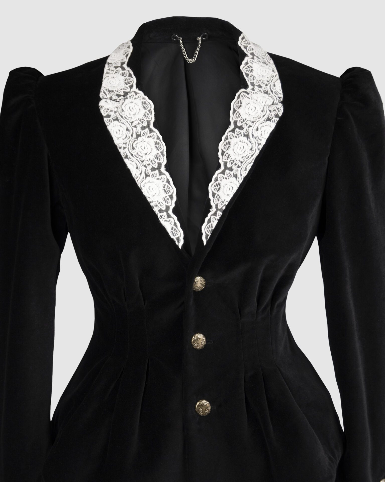 Fitted, single breasted cotton velvet jacket with a narrow peak lapel collar, released tucks at the waist, side seam pockets, and a softly pointed front hem.