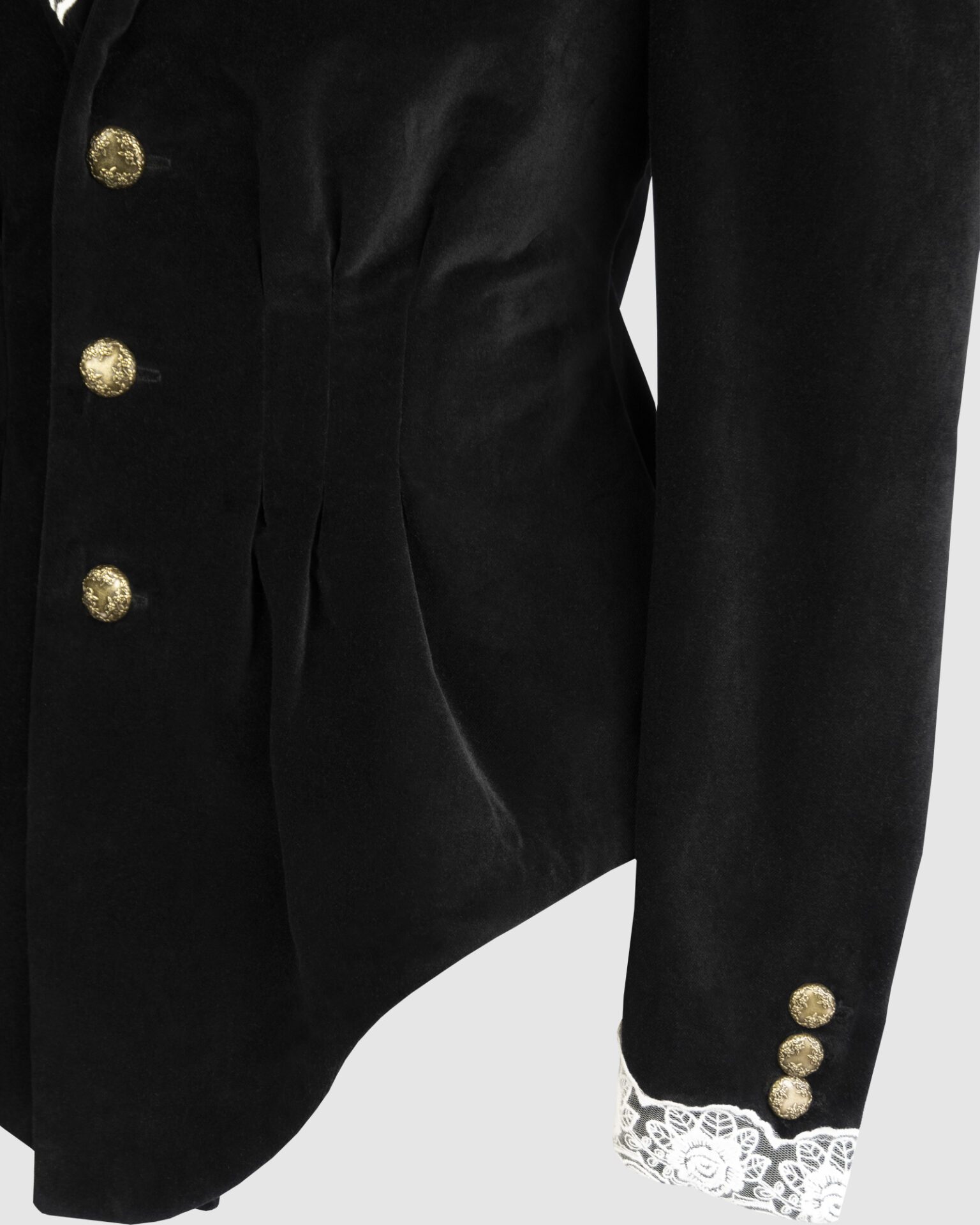 Fitted, single breasted cotton velvet jacket with a narrow peak lapel collar, released tucks at the waist, side seam pockets, and a softly pointed front hem.