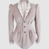Fitted, single breasted cotton velvet jacket with a narrow peak lapel collar, released tucks at the waist, side seam pockets, and a softly pointed front hem.