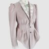 Fitted, single breasted cotton velvet jacket with a narrow peak lapel collar, released tucks at the waist, side seam pockets, and a softly pointed front hem.