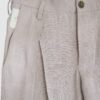 Trousers with overlapping pleats
