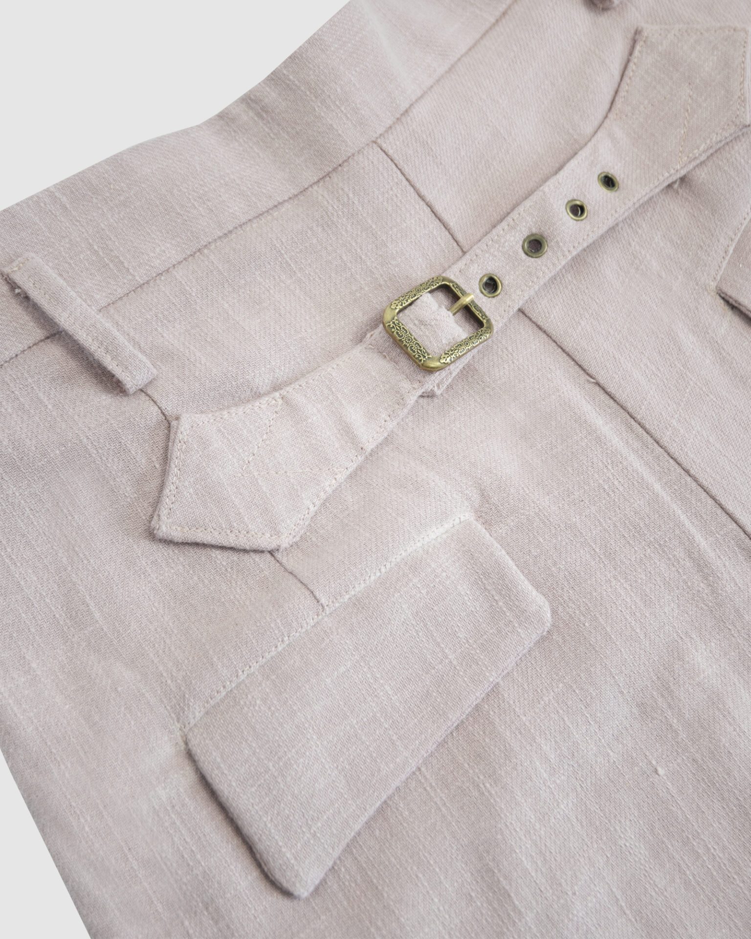 Trousers with overlapping pleats