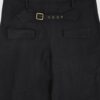 Trousers with overlapping pleats