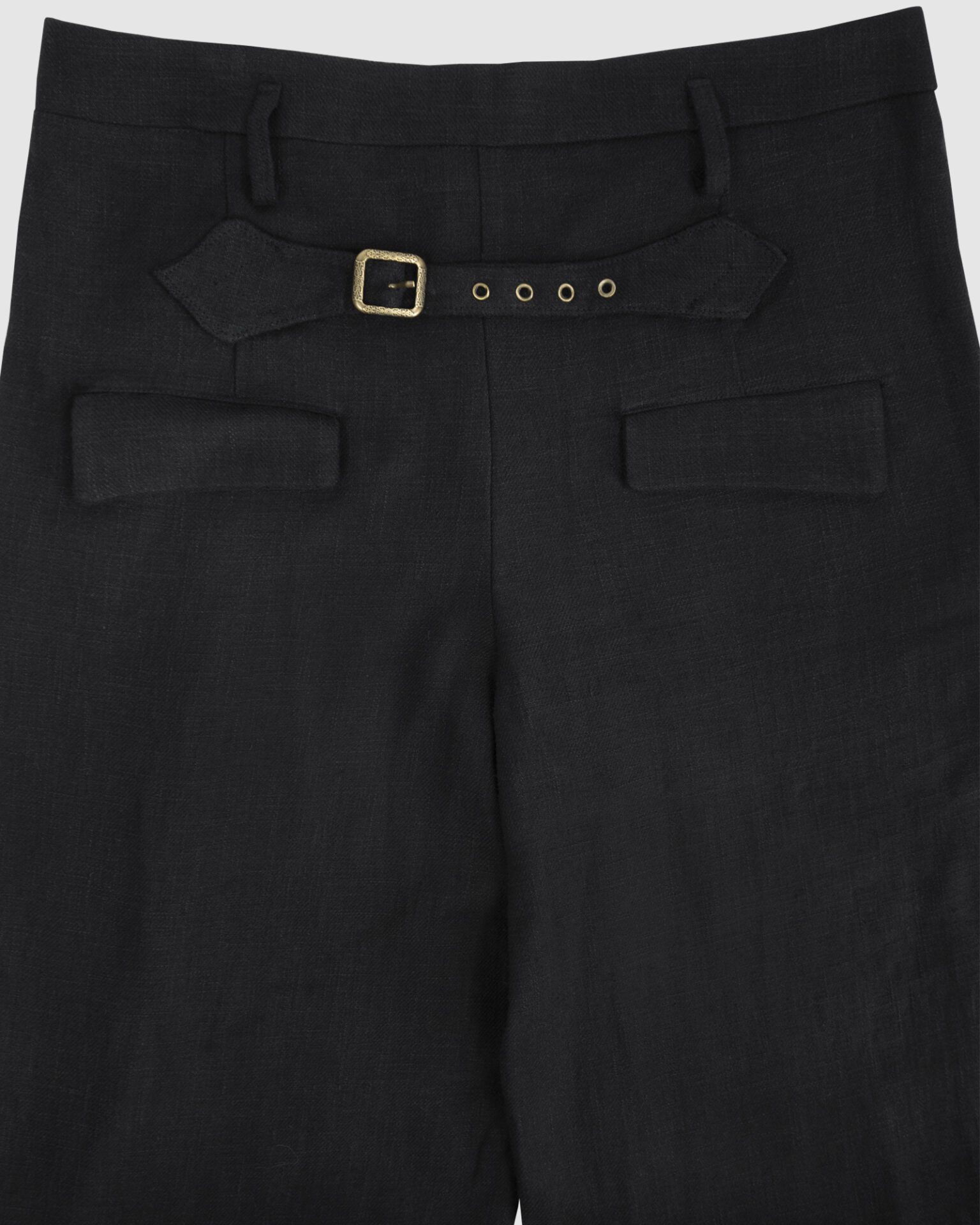 Trousers with overlapping pleats
