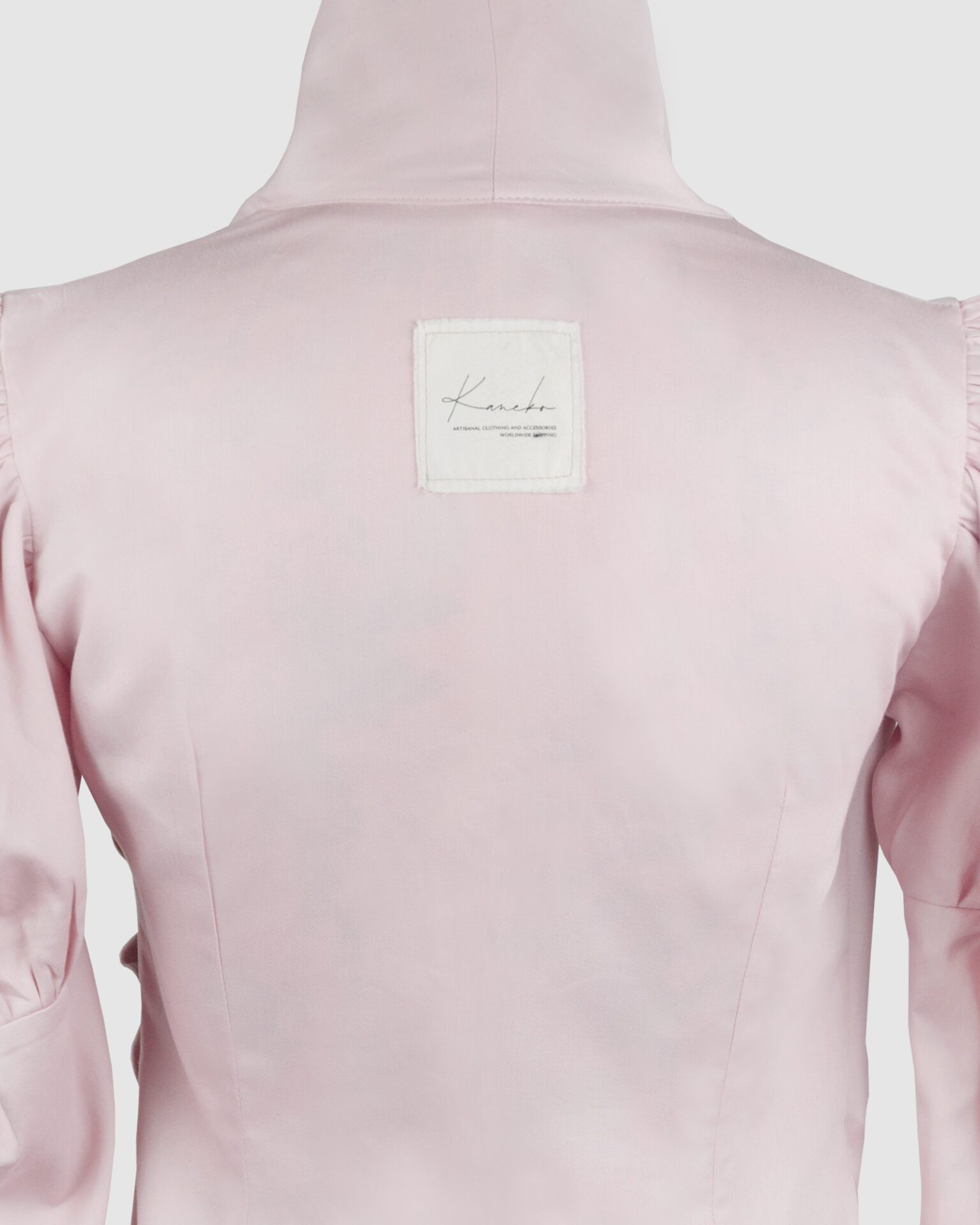 Cotton satin fitted blouse with a draped front and voluminous sleeves.