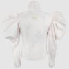Cotton satin fitted blouse with a draped front and voluminous sleeves.