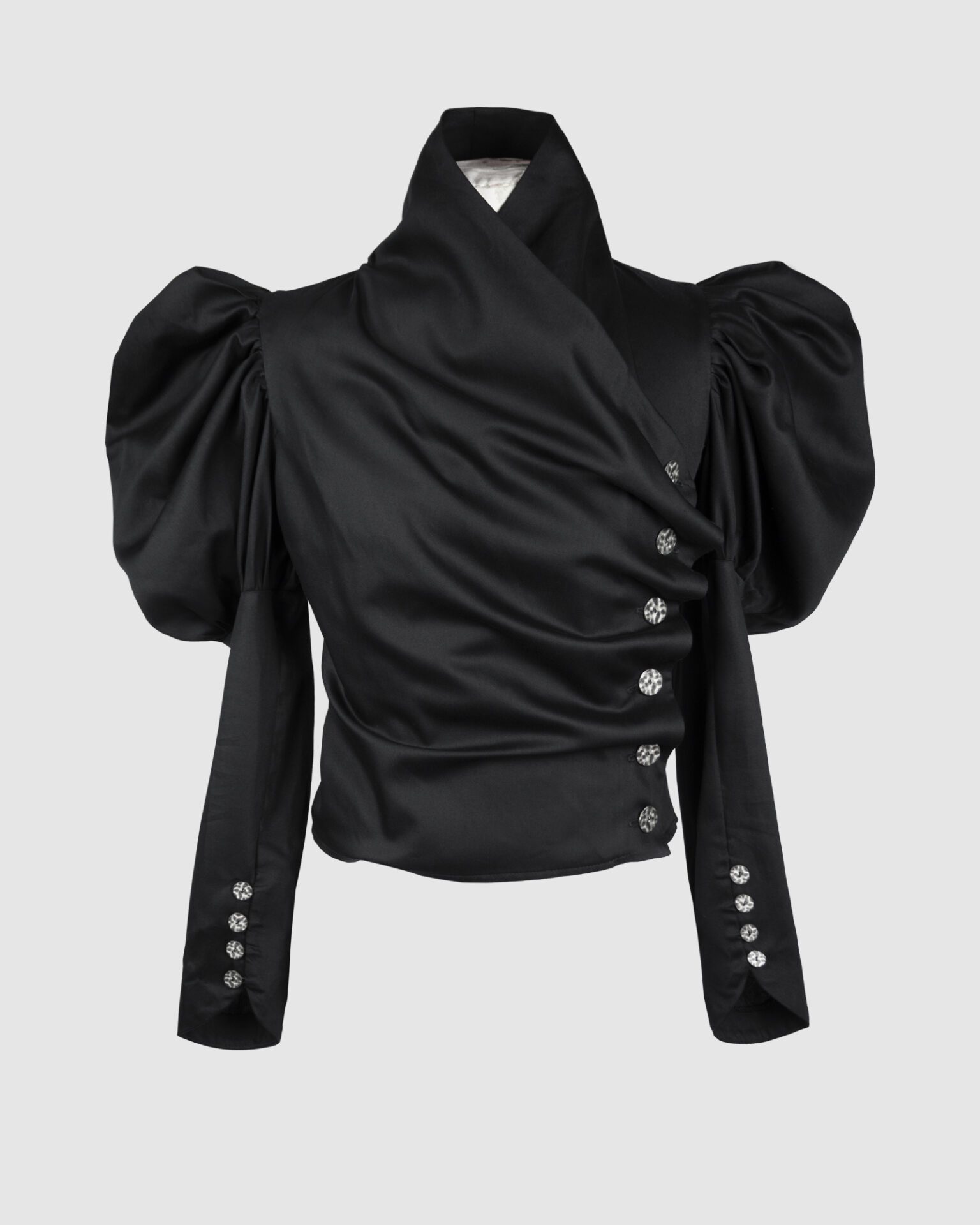 Cotton satin fitted blouse with a draped front and voluminous sleeves.
