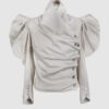 Cotton satin fitted blouse with a draped front and voluminous sleeves.