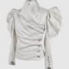 Cotton satin fitted blouse with a draped front and voluminous sleeves.