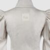 Cotton satin fitted blouse with a draped front and voluminous sleeves.