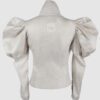 Cotton satin fitted blouse with a draped front and voluminous sleeves.