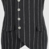 The long, fitted vest features a stand collar, a welt breast pocket, and pockets with pointed flaps.
