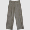 Regular rise, wide leg trousers. The front features a hidden metal button fastening, overlapping architectural pleats, and slash pockets.