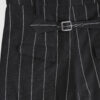 Regular rise, wide leg trousers. The front features a hidden metal button fastening, overlapping architectural pleats, and slash pockets.