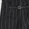 Regular rise, wide leg trousers. The front features a hidden metal button fastening, overlapping architectural pleats, and slash pockets.