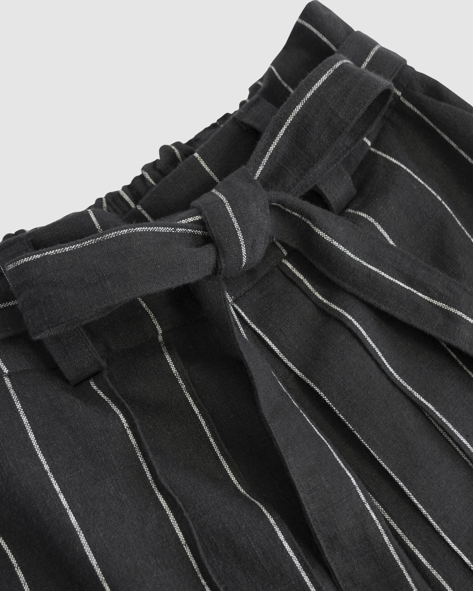 The piece is inspired by traditional Japanese hakama trousers. It is a pair of wide-legged trousers with a high waistband.