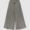 The piece is inspired by traditional Japanese hakama trousers. It is a pair of wide-legged trousers with a high waistband.