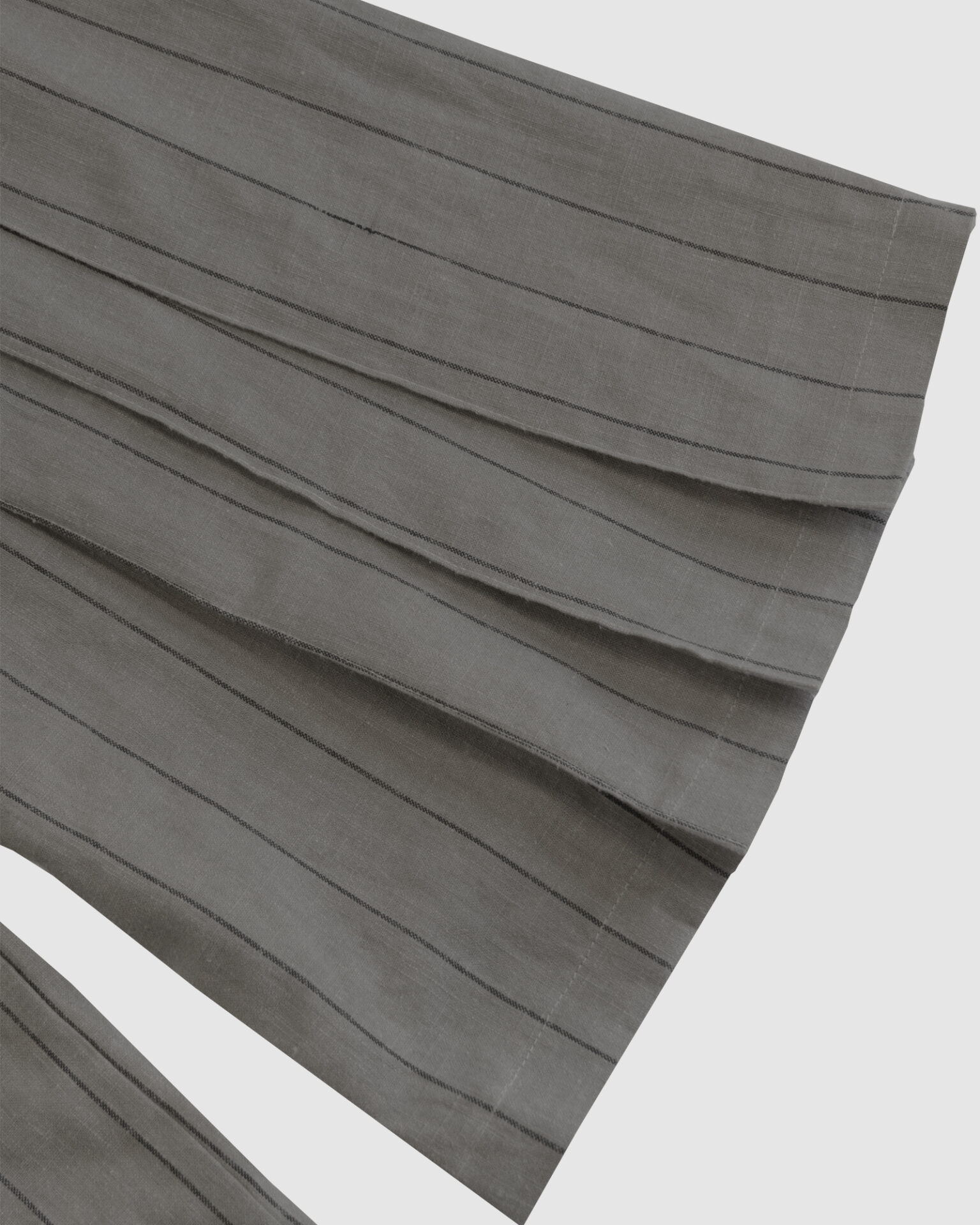 The piece is inspired by traditional Japanese hakama trousers. It is a pair of wide-legged trousers with a high waistband.