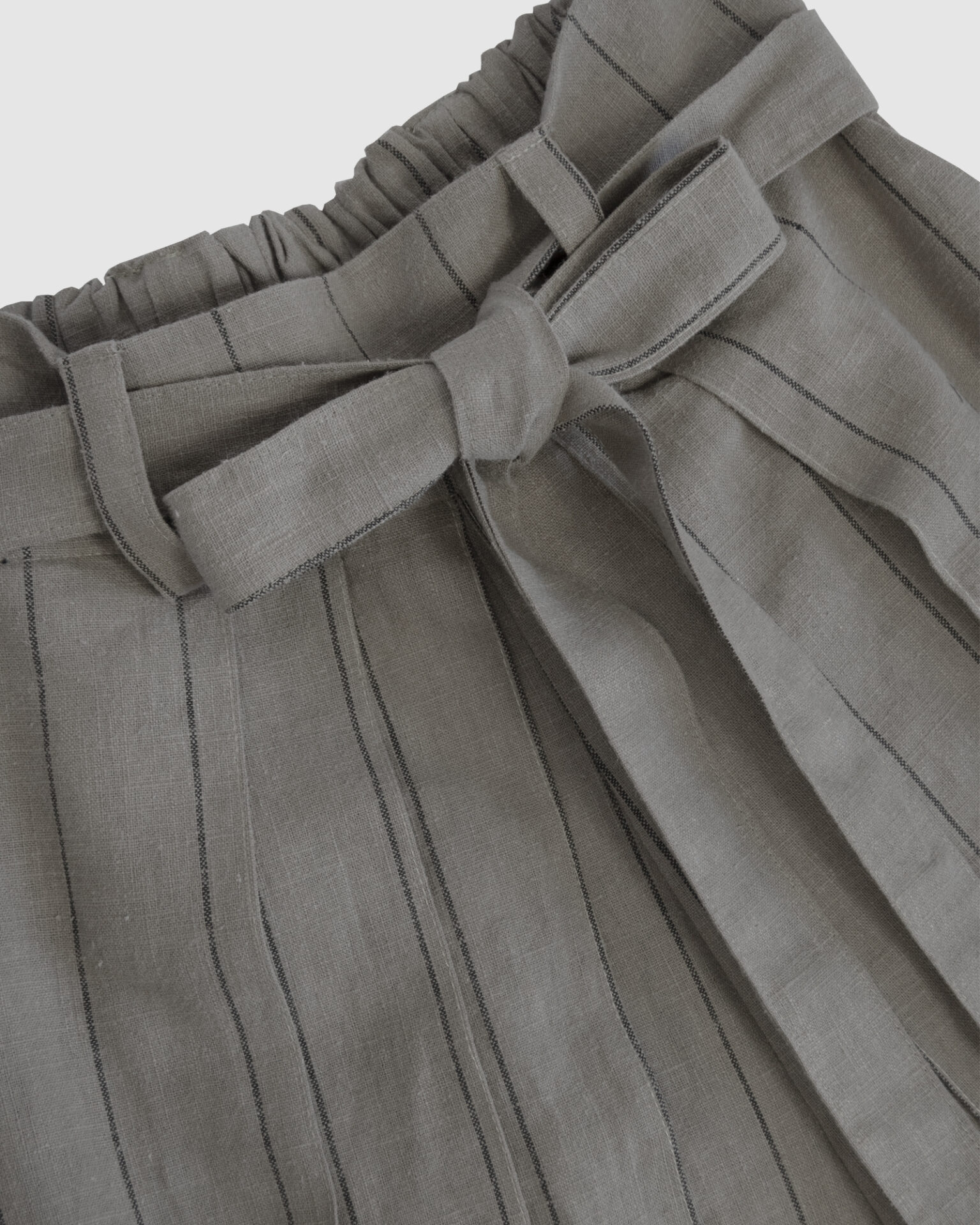 The piece is inspired by traditional Japanese hakama trousers. It is a pair of wide-legged trousers with a high waistband.