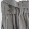 The piece is inspired by traditional Japanese hakama trousers. It is a pair of wide-legged trousers with a high waistband.