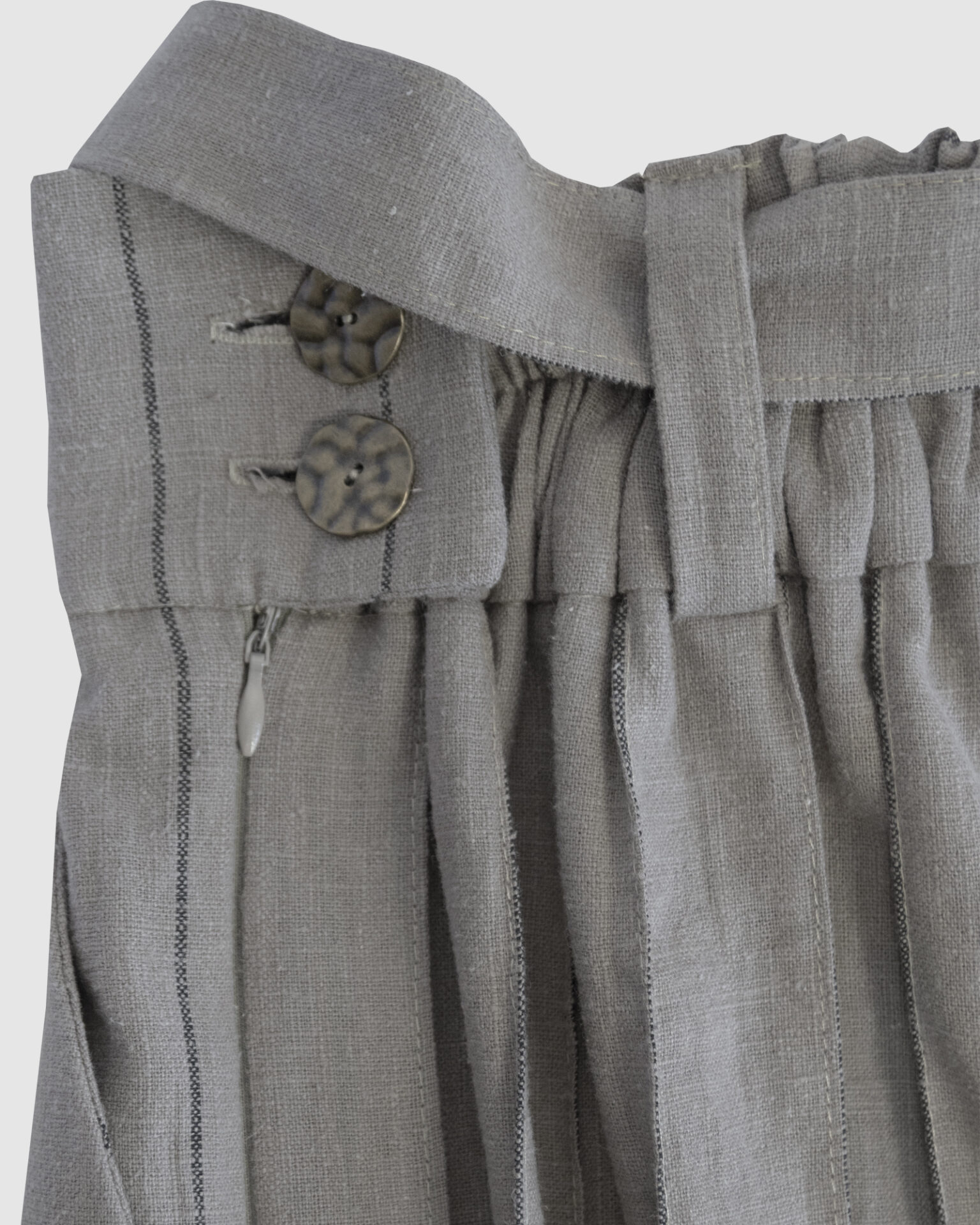 The piece is inspired by traditional Japanese hakama trousers. It is a pair of wide-legged trousers with a high waistband.