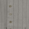 The long, fitted vest features a stand collar, a welt breast pocket, and pockets with pointed flaps.