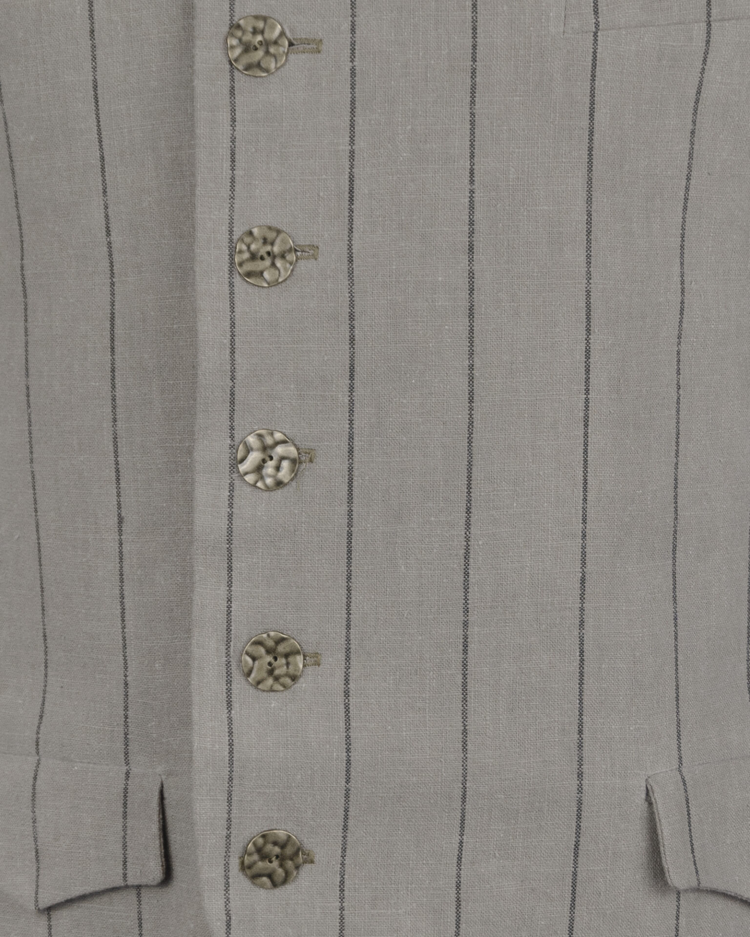 The long, fitted vest features a stand collar, a welt breast pocket, and pockets with pointed flaps.