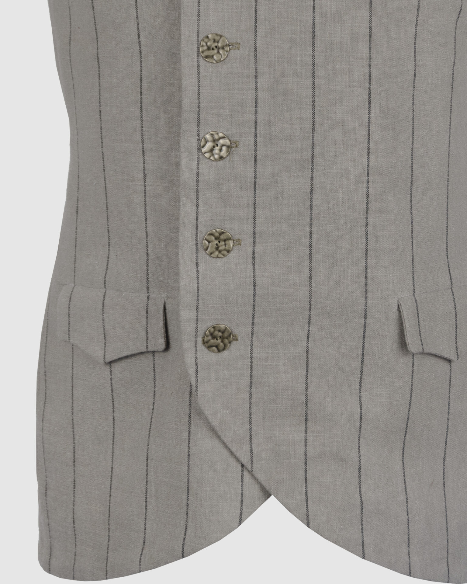 The long, fitted vest features a stand collar, a welt breast pocket, and pockets with pointed flaps.