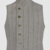 The long, fitted vest features a stand collar, a welt breast pocket, and pockets with pointed flaps.