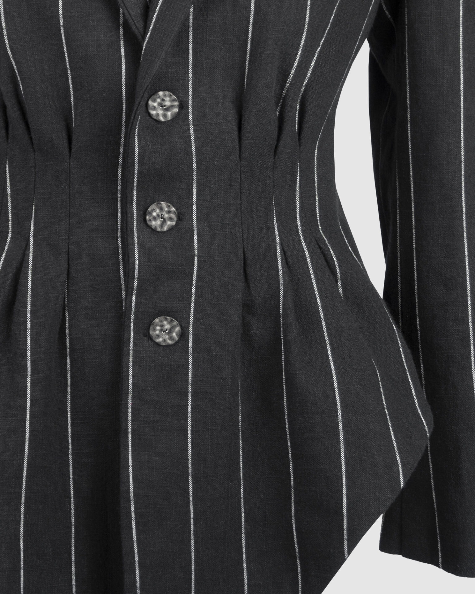 Fitted, single-breasted cotton velvet jacket with narrow peak lapels, released tucks at the waist, side seam pockets, and a softly pointed front hem.