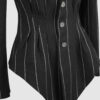 Fitted, single-breasted cotton velvet jacket with narrow peak lapels, released tucks at the waist, side seam pockets, and a softly pointed front hem.