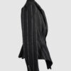 Fitted, single-breasted cotton velvet jacket with narrow peak lapels, released tucks at the waist, side seam pockets, and a softly pointed front hem.