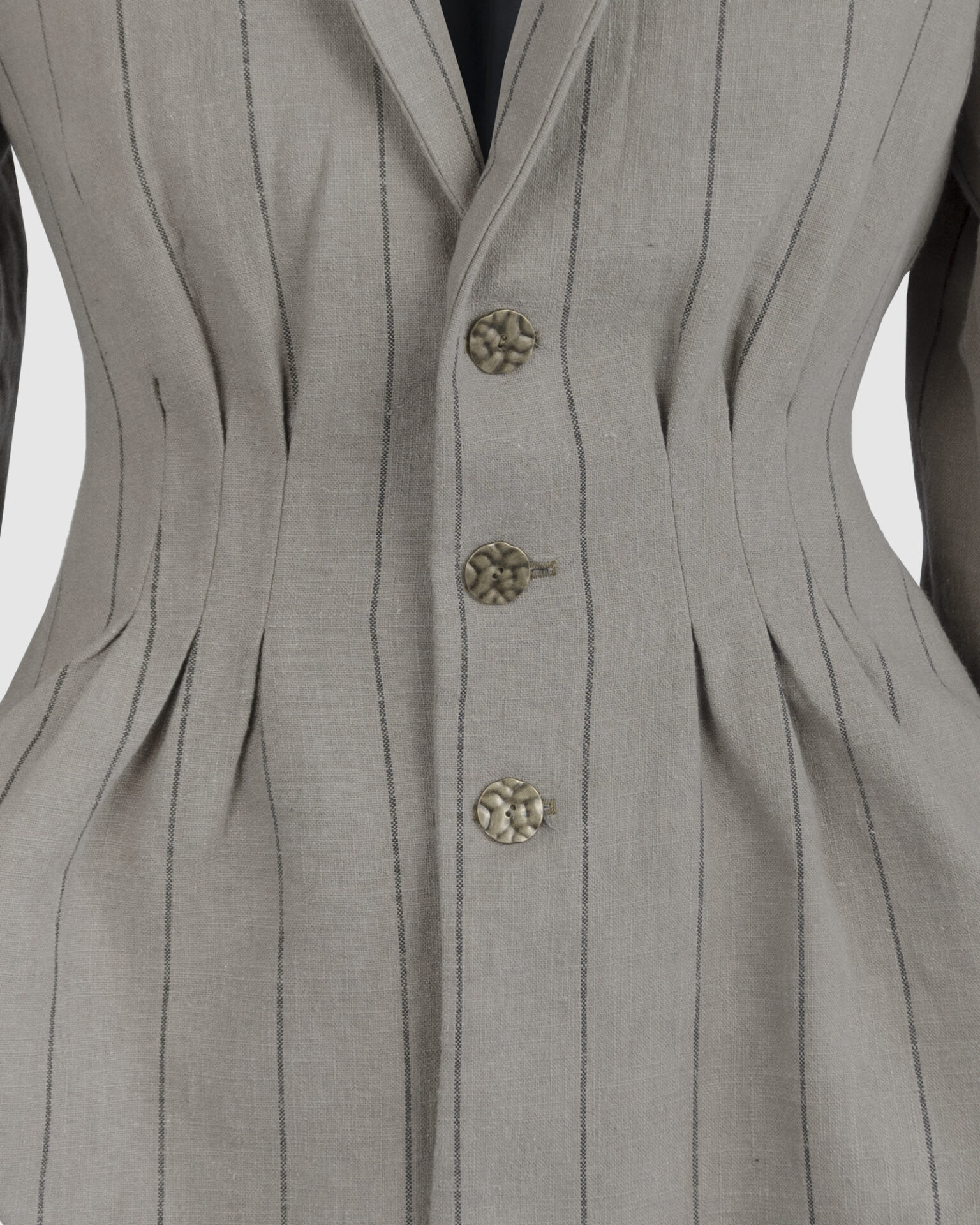 Fitted, single-breasted cotton velvet jacket with narrow peak lapels, released tucks at the waist, side seam pockets, and a softly pointed front hem.
