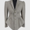 Fitted, single-breasted cotton velvet jacket with narrow peak lapels, released tucks at the waist, side seam pockets, and a softly pointed front hem.