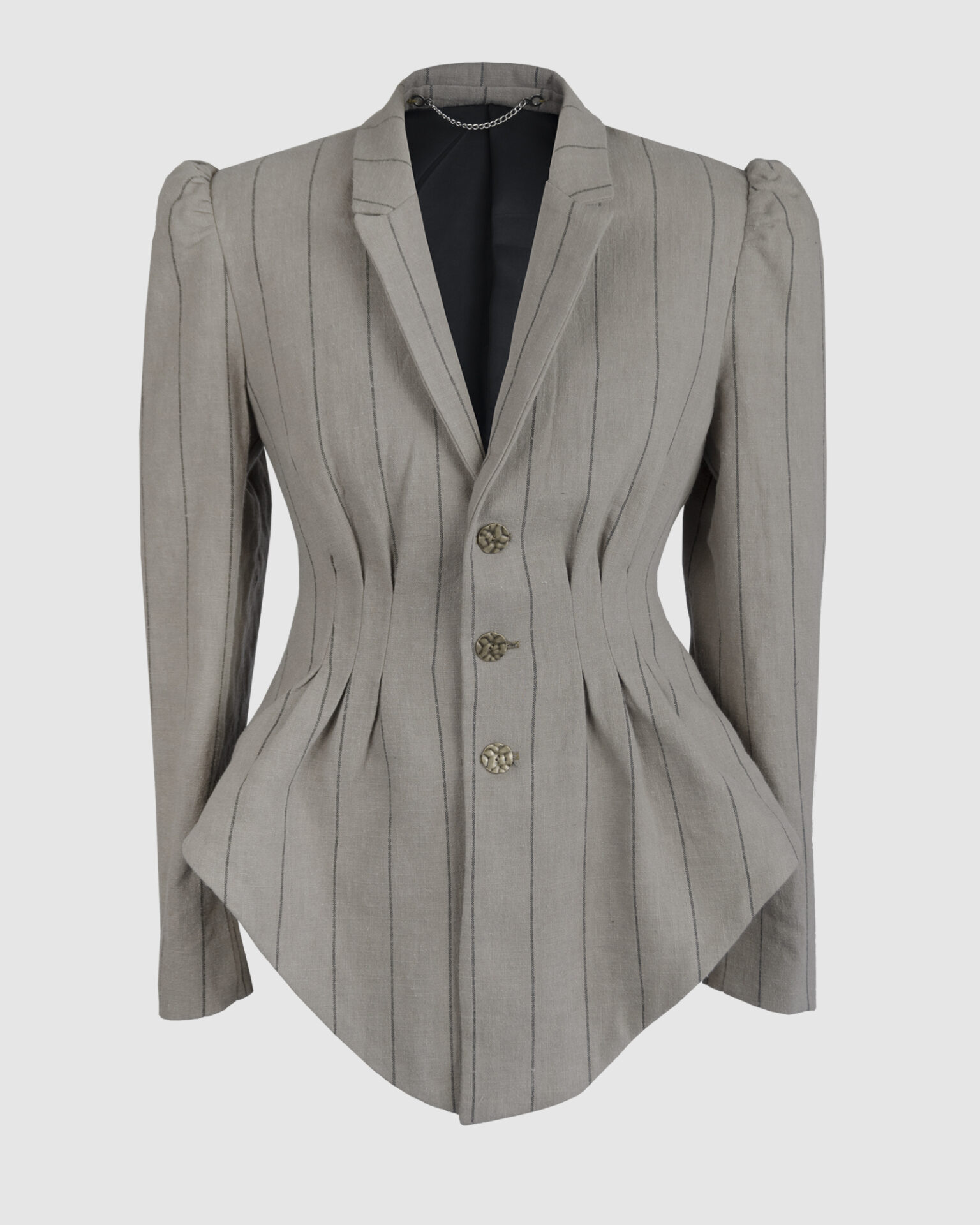 Fitted, single-breasted cotton velvet jacket with narrow peak lapels, released tucks at the waist, side seam pockets, and a softly pointed front hem.
