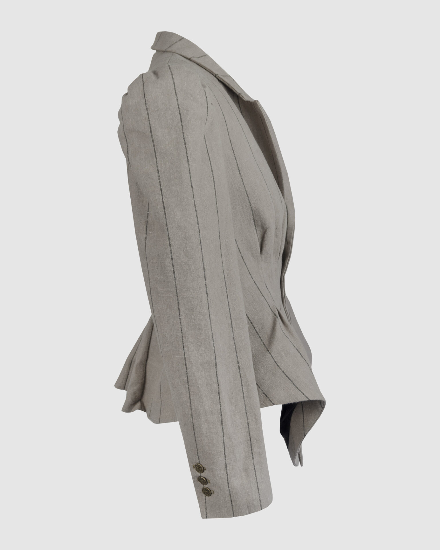 Fitted, single-breasted cotton velvet jacket with narrow peak lapels, released tucks at the waist, side seam pockets, and a softly pointed front hem.