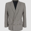 Semi-fitted double-breasted jacket with peak lapels, a welt breast pocket, and pockets with asymmetrical flaps. Designed in a 4x1 configuration