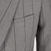 Semi-fitted double-breasted jacket with peak lapels, a welt breast pocket, and pockets with asymmetrical flaps. Designed in a 4x1 configuration