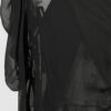 Fitted blouse with a draped front and voluminous sleeves