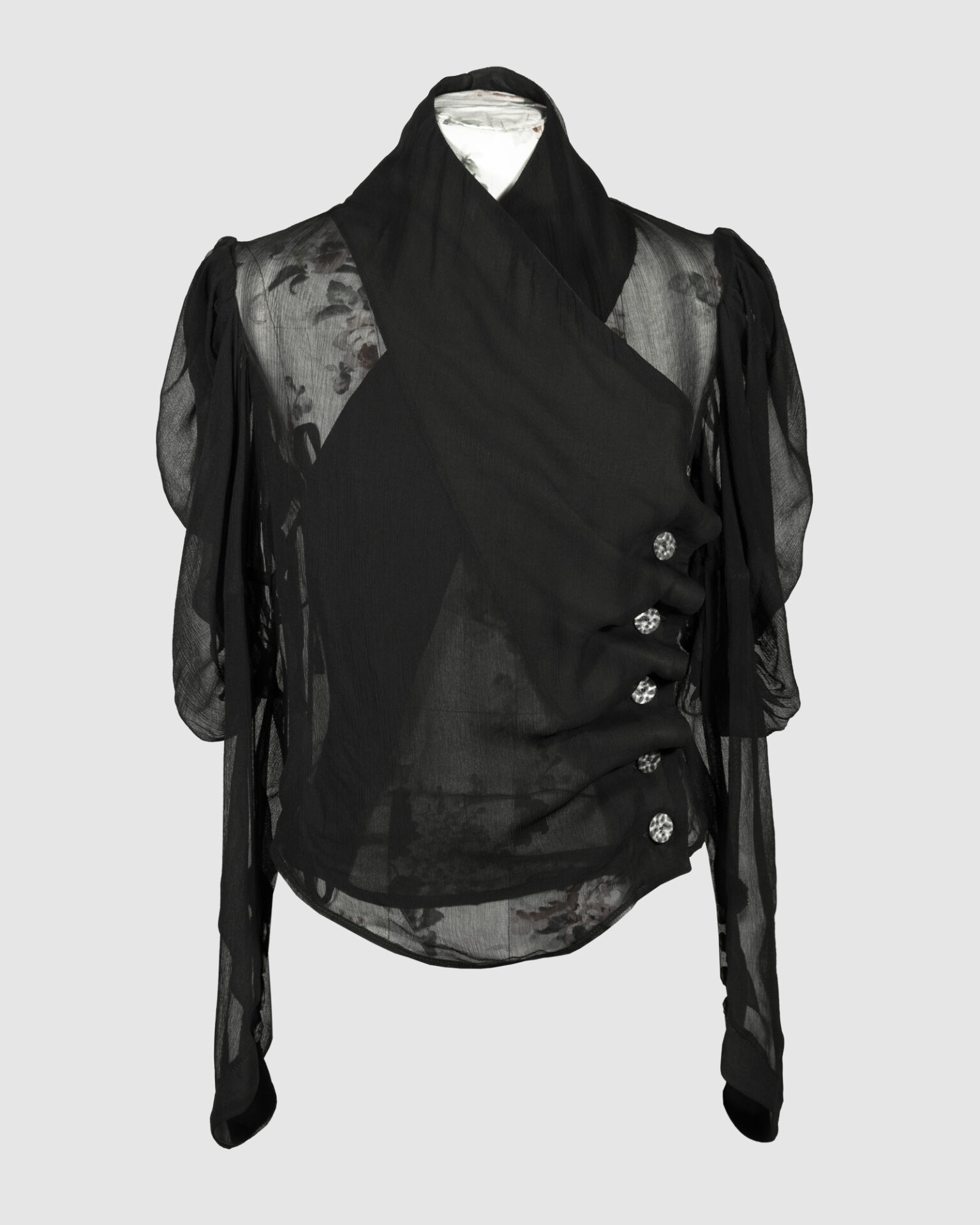 Fitted blouse with a draped front and voluminous sleeves
