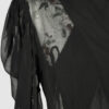 Fitted blouse with a draped front and voluminous sleeves