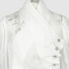 Fitted blouse with a draped front and voluminous sleeves
