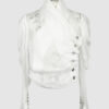 Fitted blouse with a draped front and voluminous sleeves